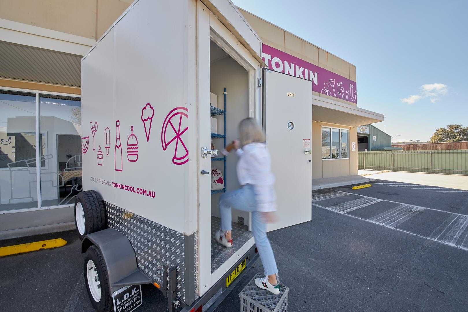 A Tonkin Group employee stepping into a Tonkin Cool Room.