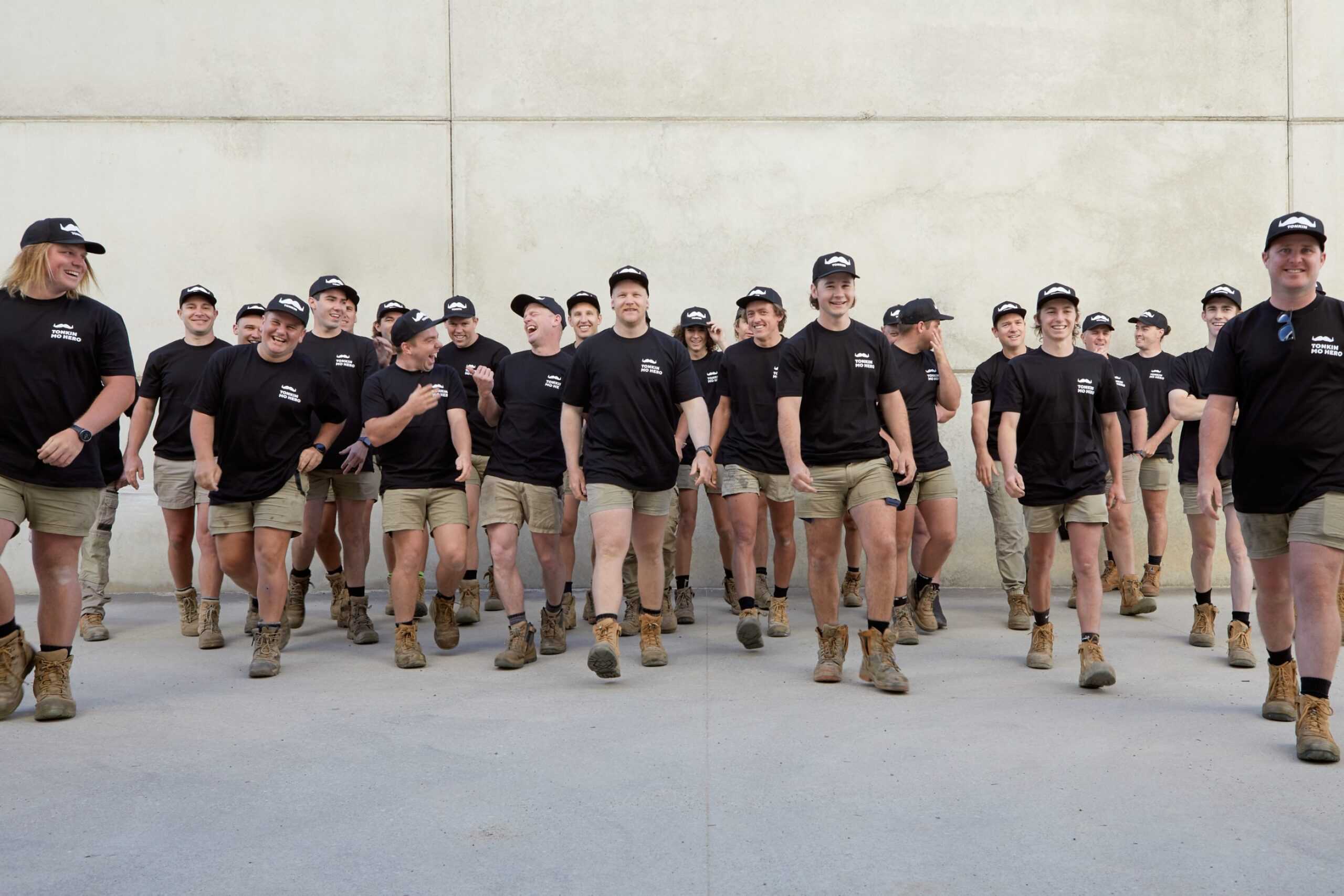 Tonkin Group employees walking towards the camera.